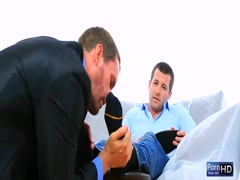 Lovely gay enjoying caressing his foot